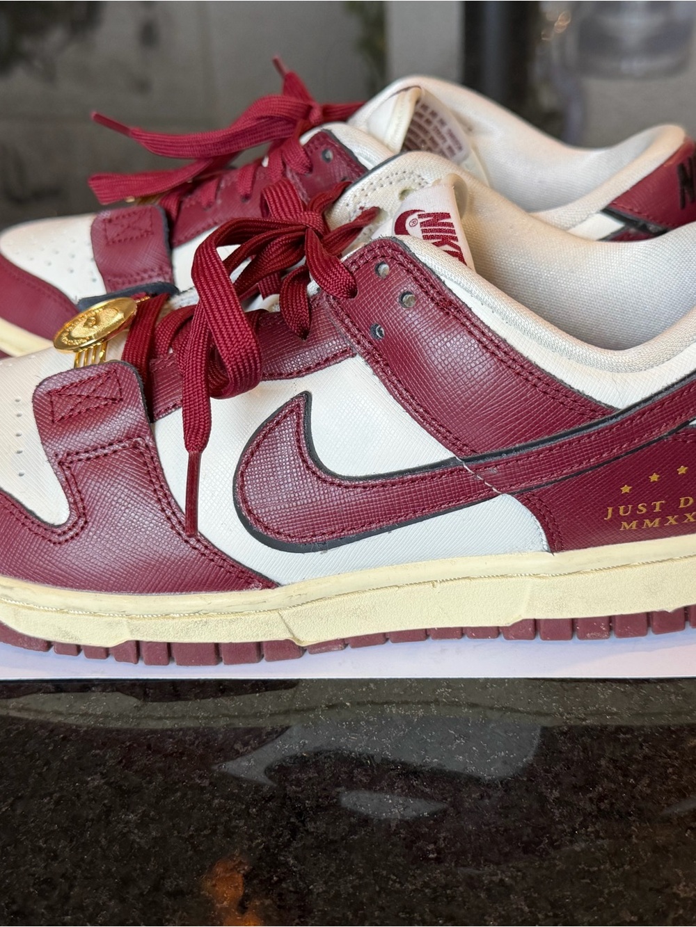 Nike Women’s Dunk Low Sneakers in Burgundy/White